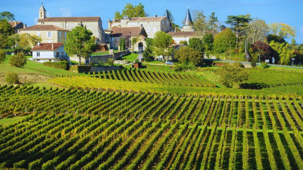 Charming stone cobblestone streets and historic medieval architecture in the wine village of Saint Emilion France.